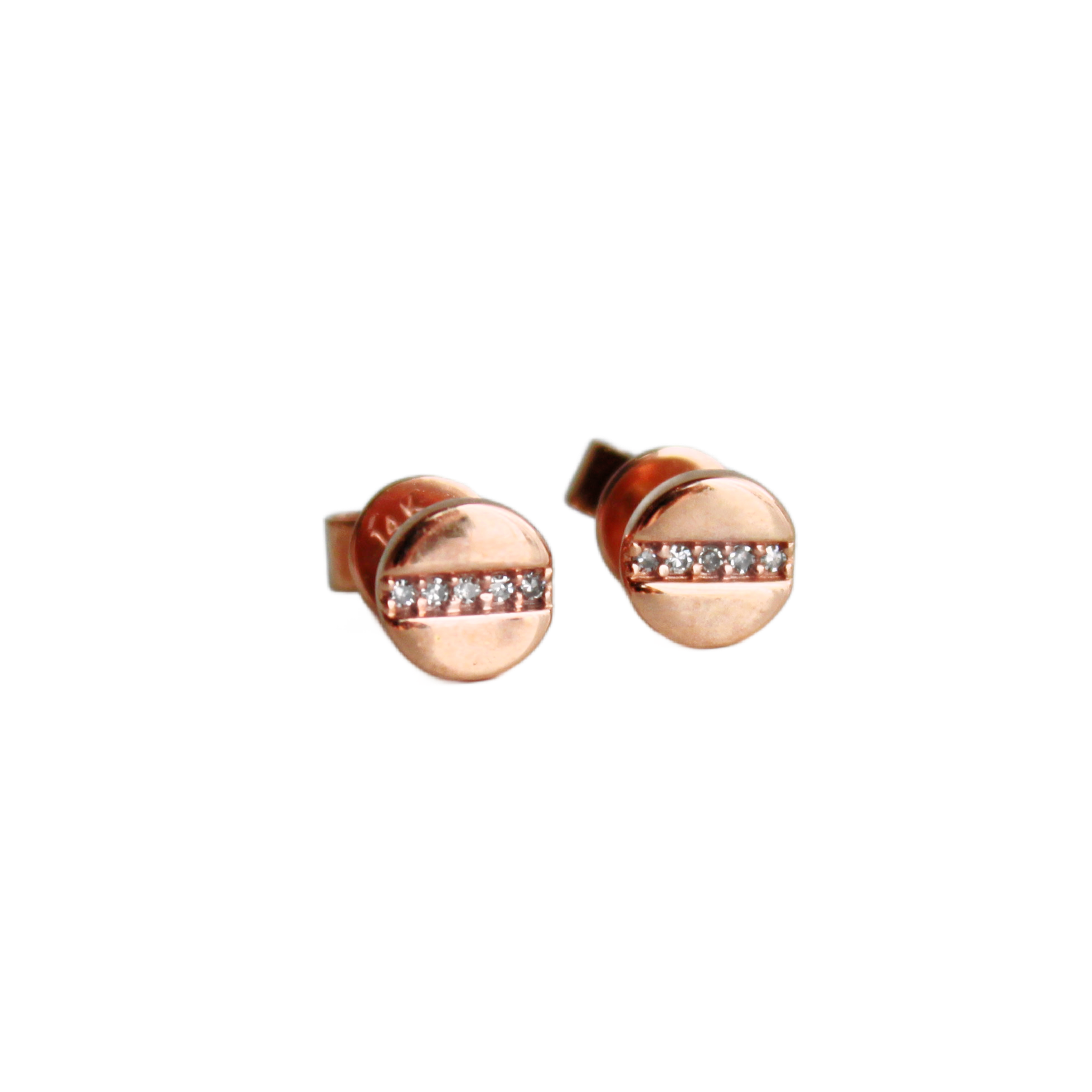 rose gold disc with white diamonds