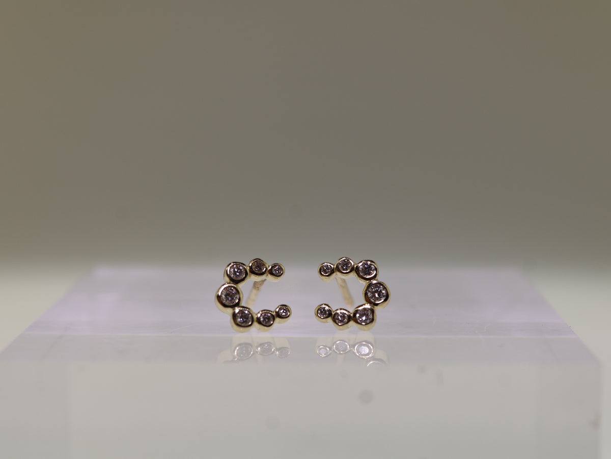 Graduated Diamond Bezel Horseshoe Studs