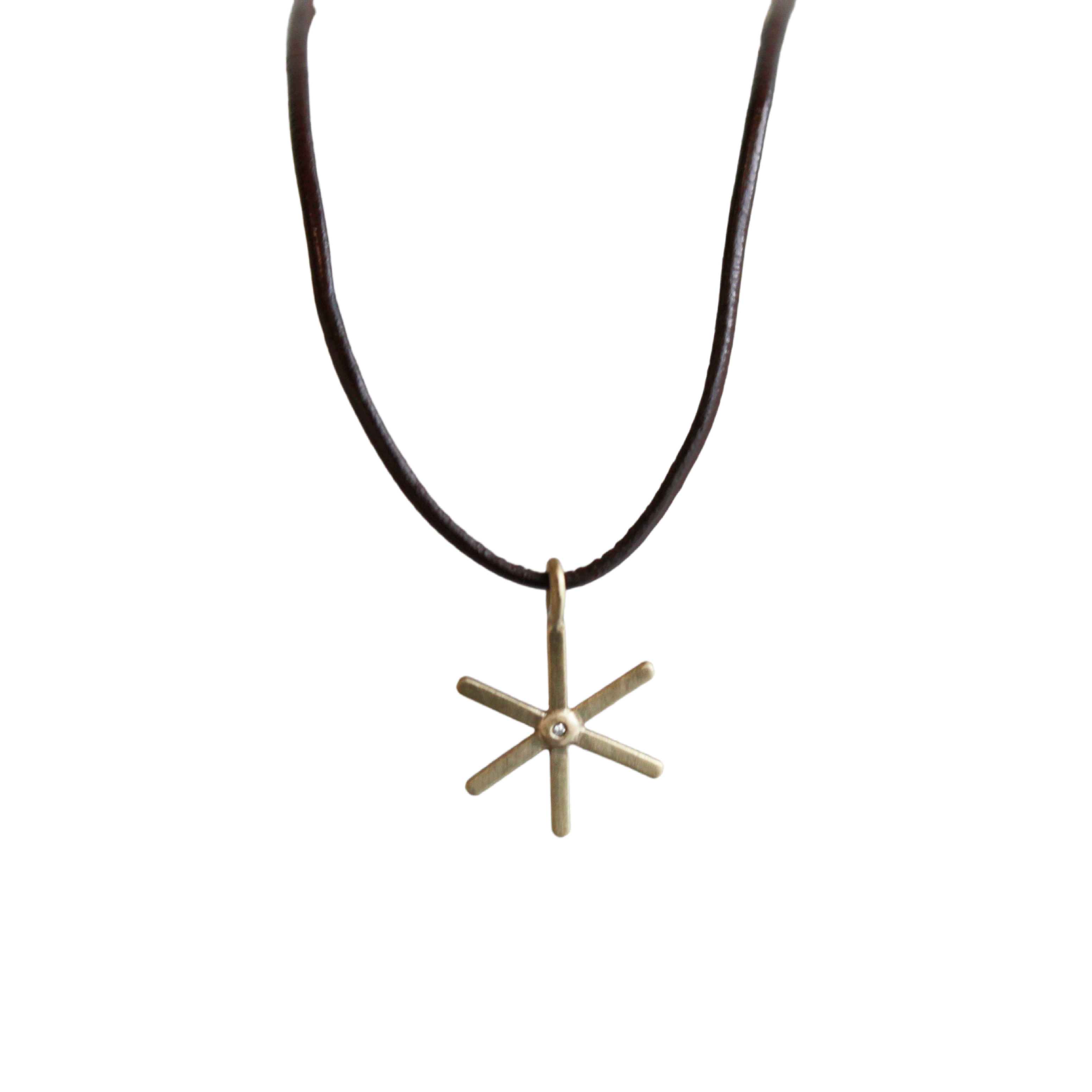 yellow gold and diamond starburst necklace on 16" brown leather 