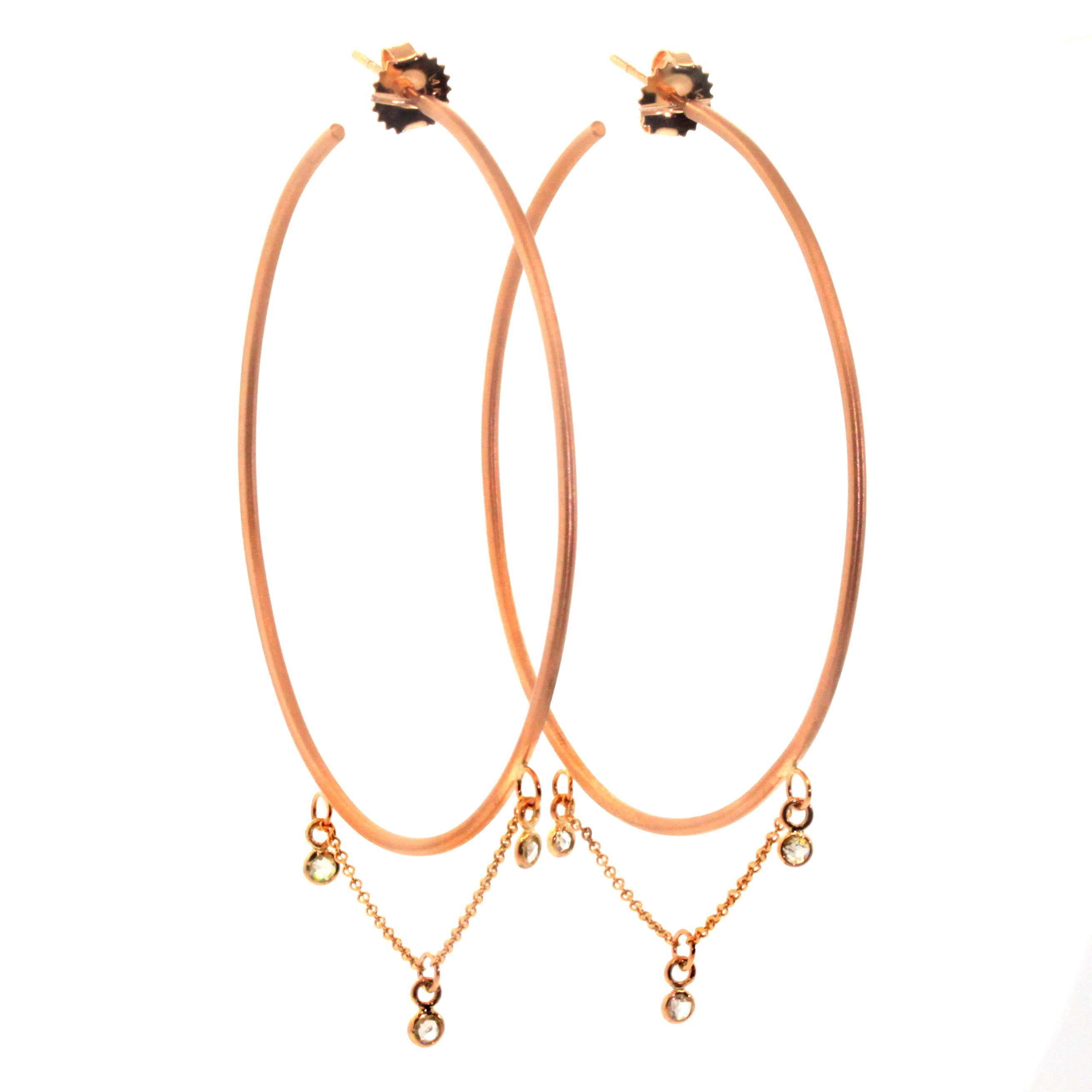 Princess Diamond Hoops handcrafted at Rebecca Lankford Designs in Houston Texas. The feature 3 rose cut diamonds bezel set in rose gold and dangling from a chain soldered to thin, large rose gold hoops.