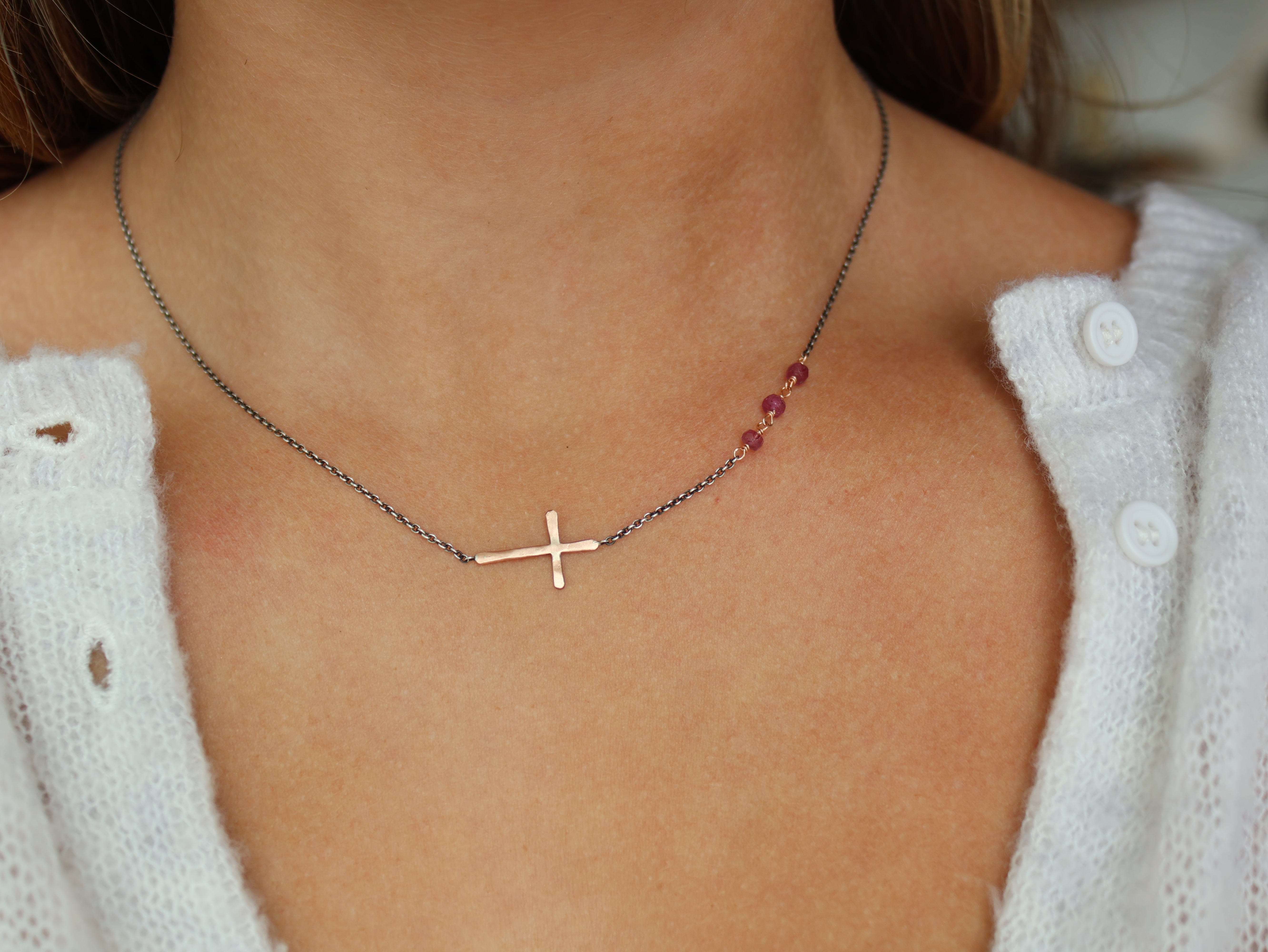 mixed metal cross with pink sapphires