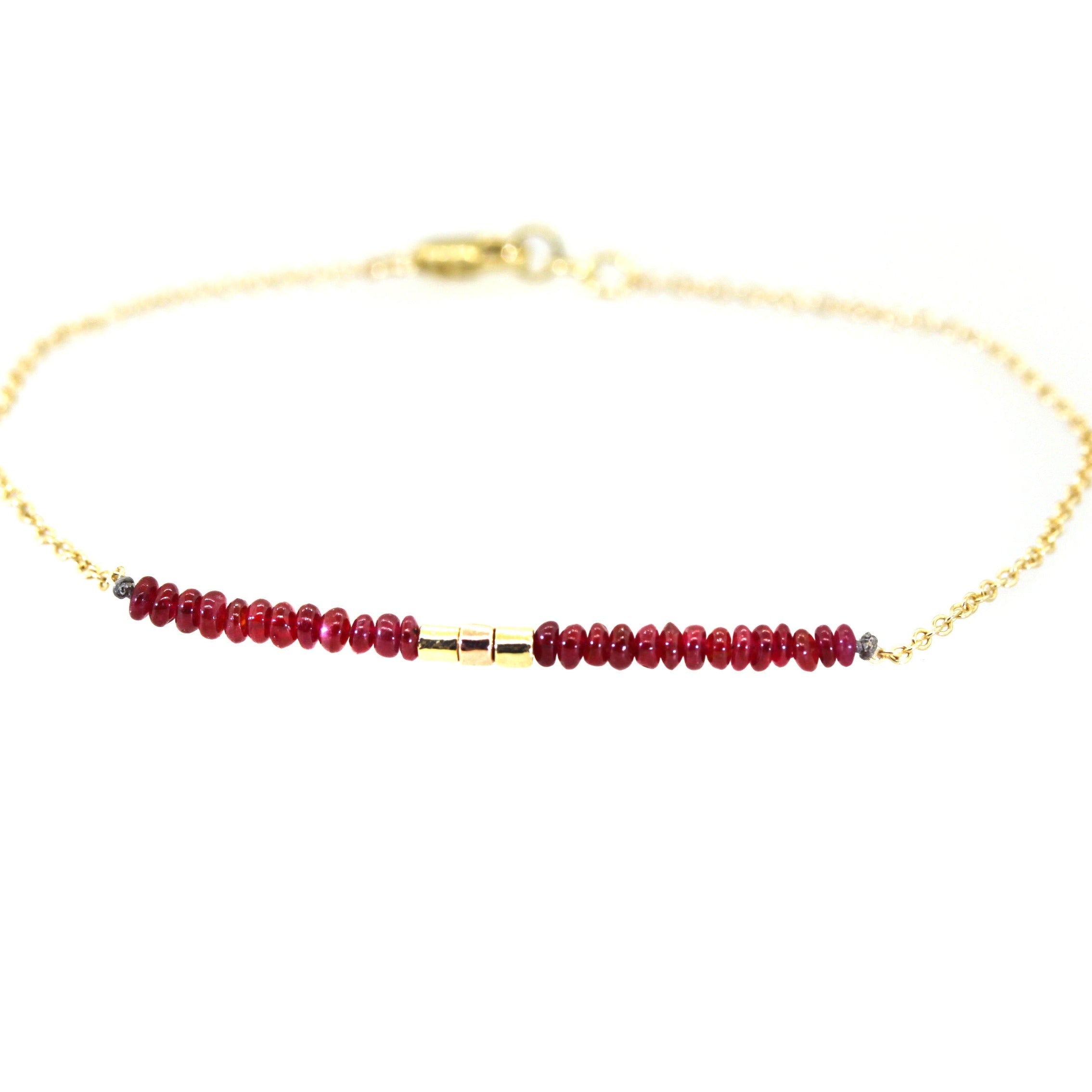 Ruby Bracelet with Three Gold Rings in Center
