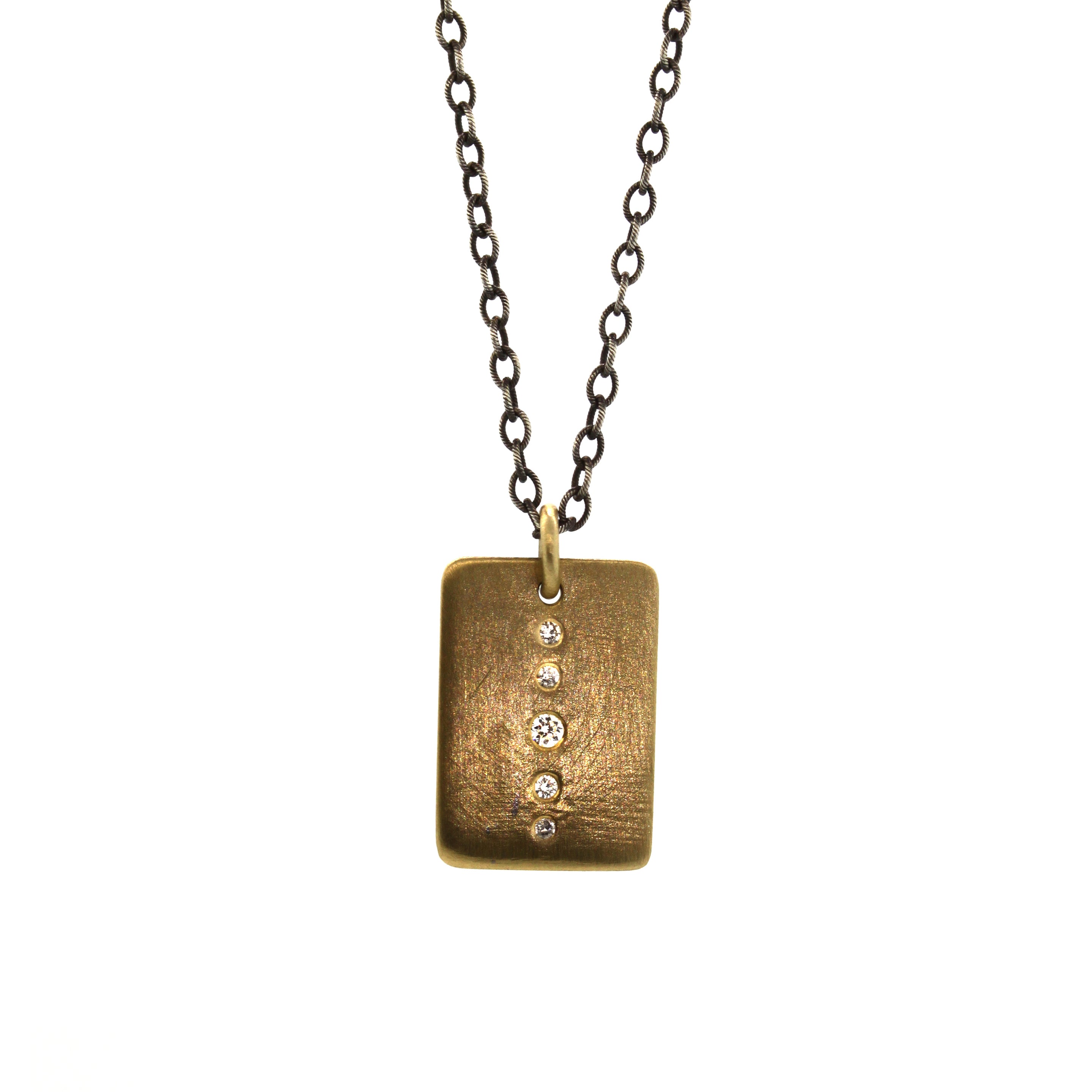 This Large Diamond Brick necklace features a rectangular gold pendant with 5 diamonds inlaid in a graduating pattern dangling from a long oxidized silver chain. It was hand crafted by one of Houston's finest custom jewelers, Rebecca Lankford, in Houston Heights. 