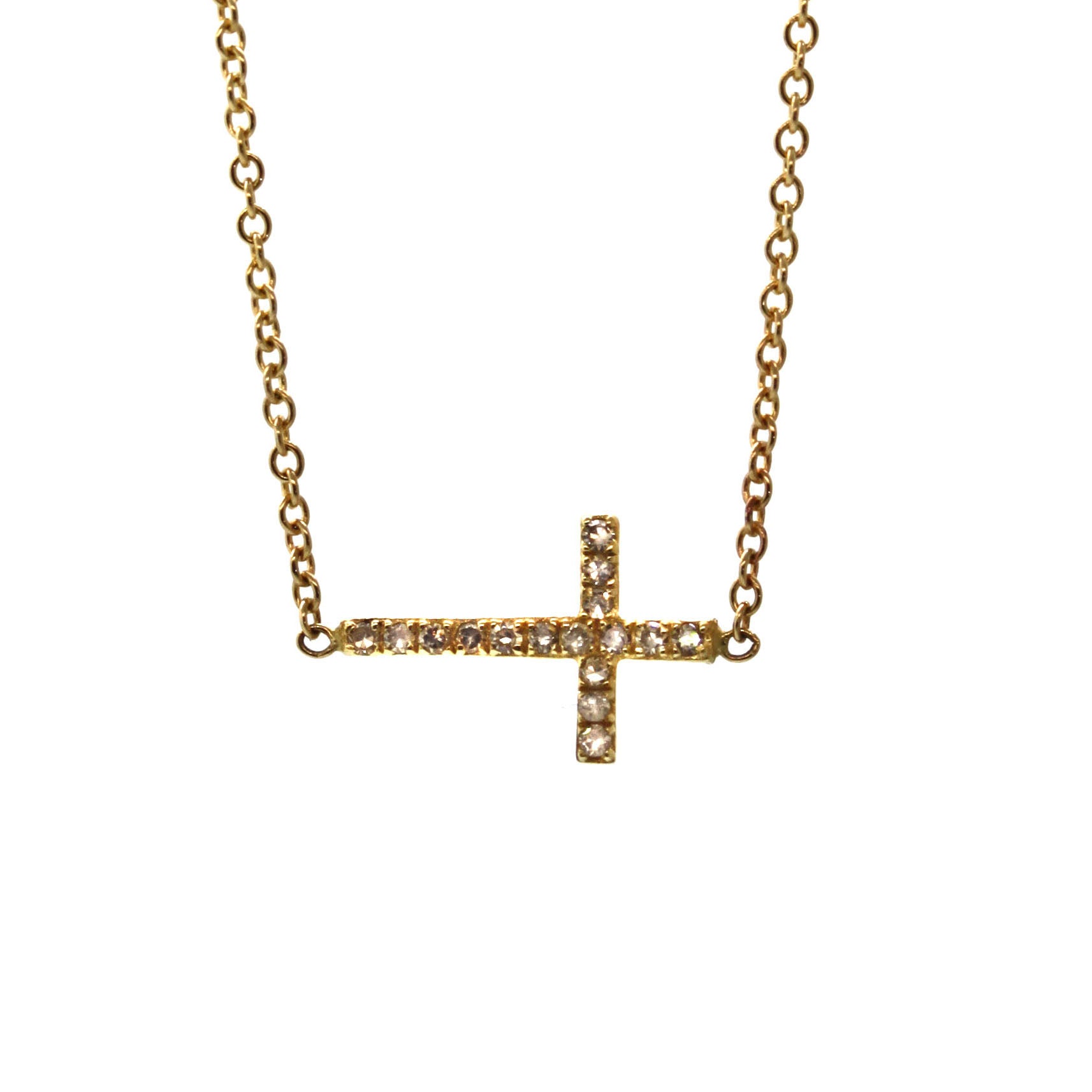 This Everyday Diamond Cross Necklace is just that! Consisting of a yellow gold cross pave set with shimmering champagne diamonds and soldered sideways into the chain, this necklace is simple, versatile, and full of sparkle! It was handcrafted at Rebecca Lankford Designs in Houston, Texas.