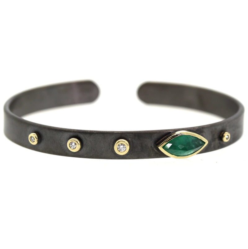 Marquise cut emerald and diamond cuff handcrafted by Rebecca Lankford in her studio in the heart of Houston, Texas.