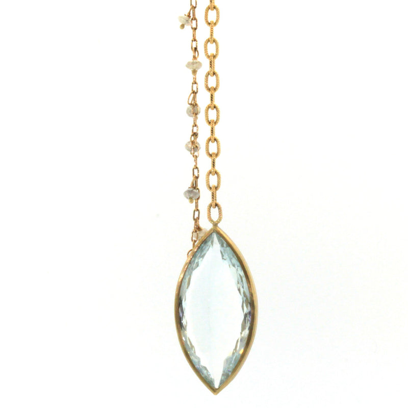 Icy marquise cut aquamarine pendant on long chain with little accenting raw diamonds dangling from another chain. This necklace was expertly crafted by Rebecca Lankford in Houston, Texas. 