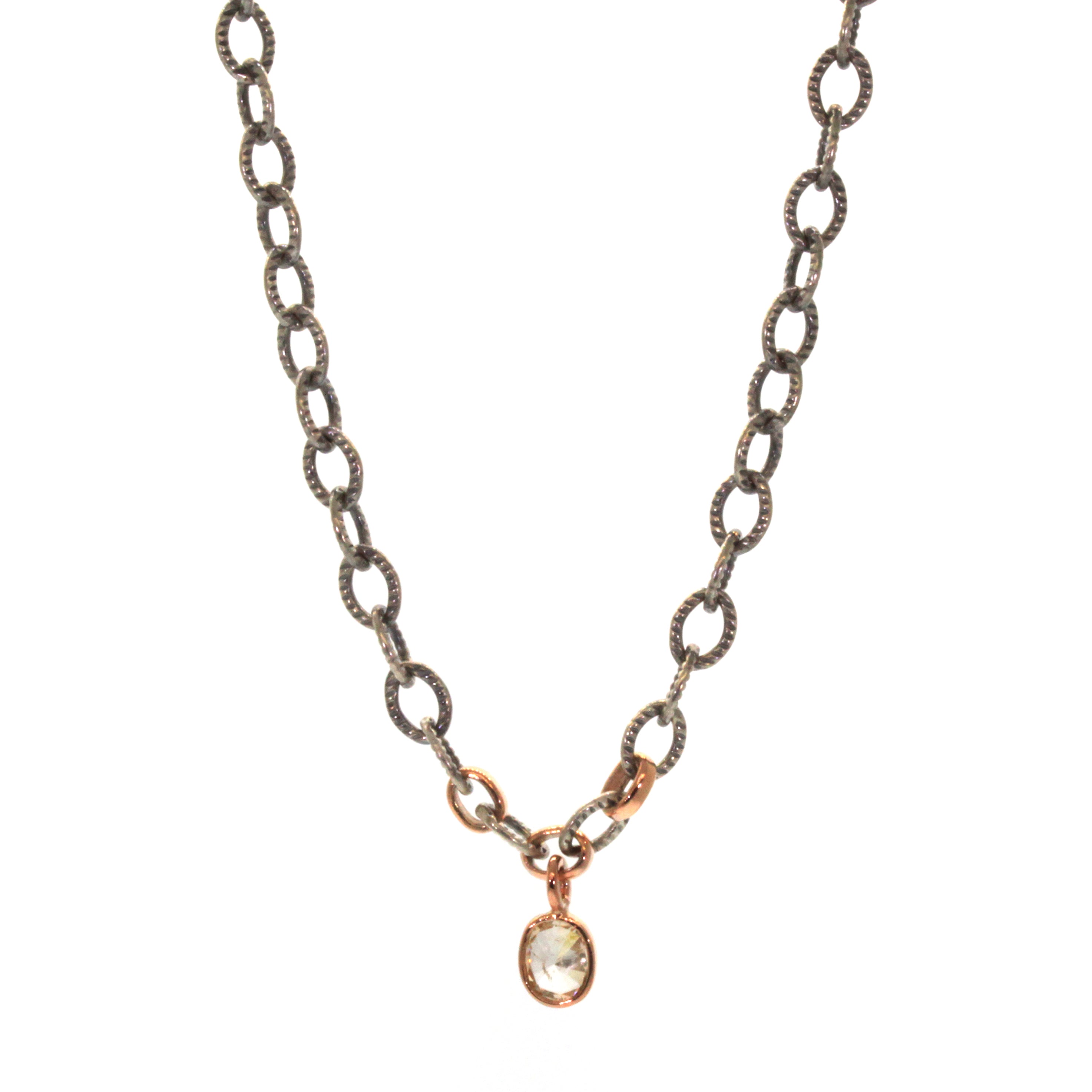 This Chunky Champagne Diamond Necklace was handcrafted at Rebecca Lankford Designs in Houston, Texas. It features a light, oval champagne diamond bezel set in rose gold on a rhodium plated chunky chain with 3 accenting rose gold links.
