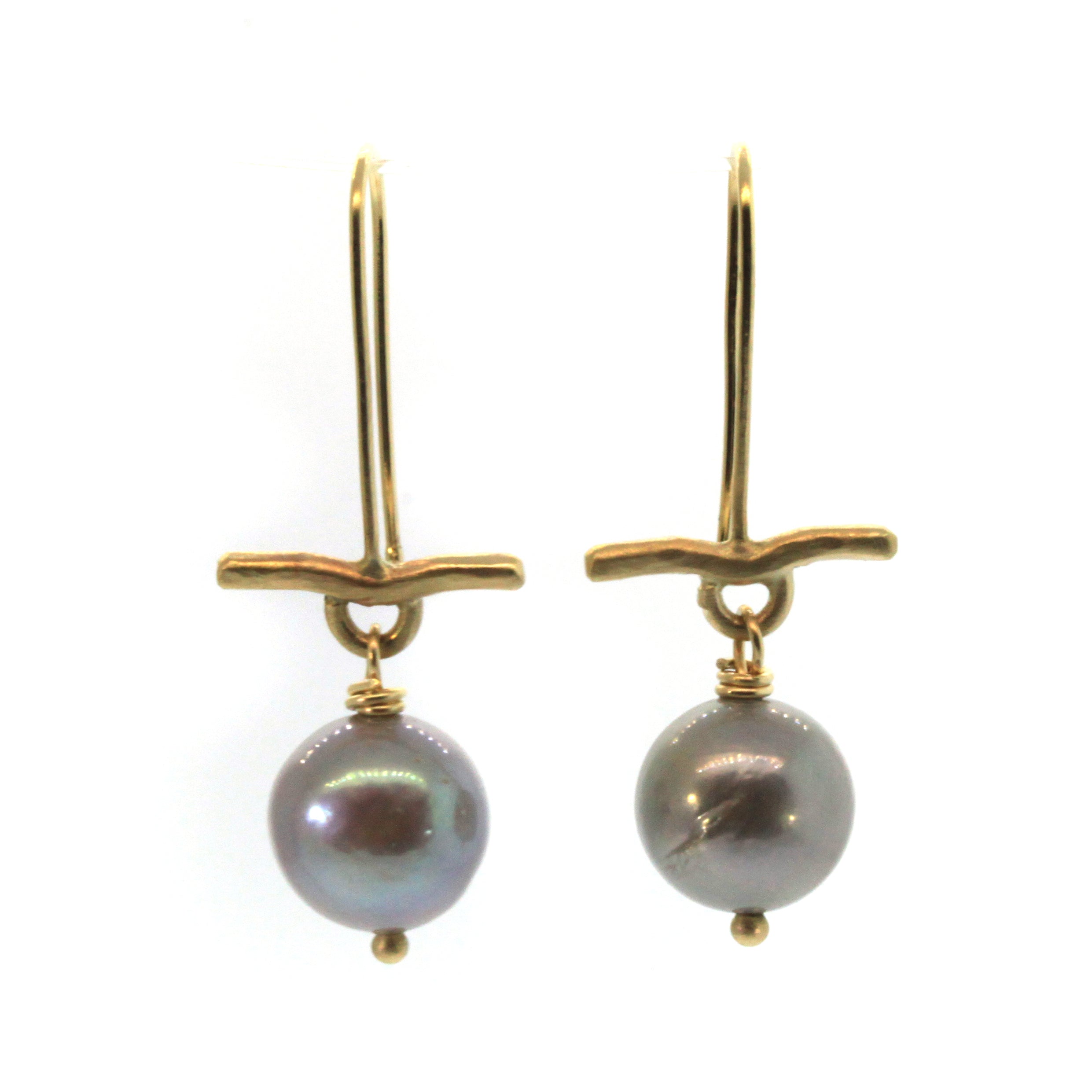 These Pearl & Gold Bar Earrings were handcrafted in Houston, Texas at Rebecca Lankford Designs. This pair features two round grey pearls accented by a textured yellow gold bar dangling from yellow gold ear wire.